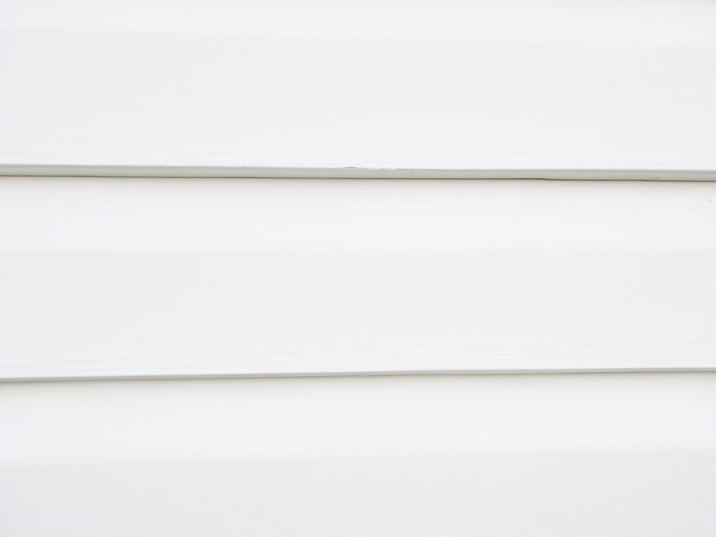 Spray Foam Overspray Removal from Siding
